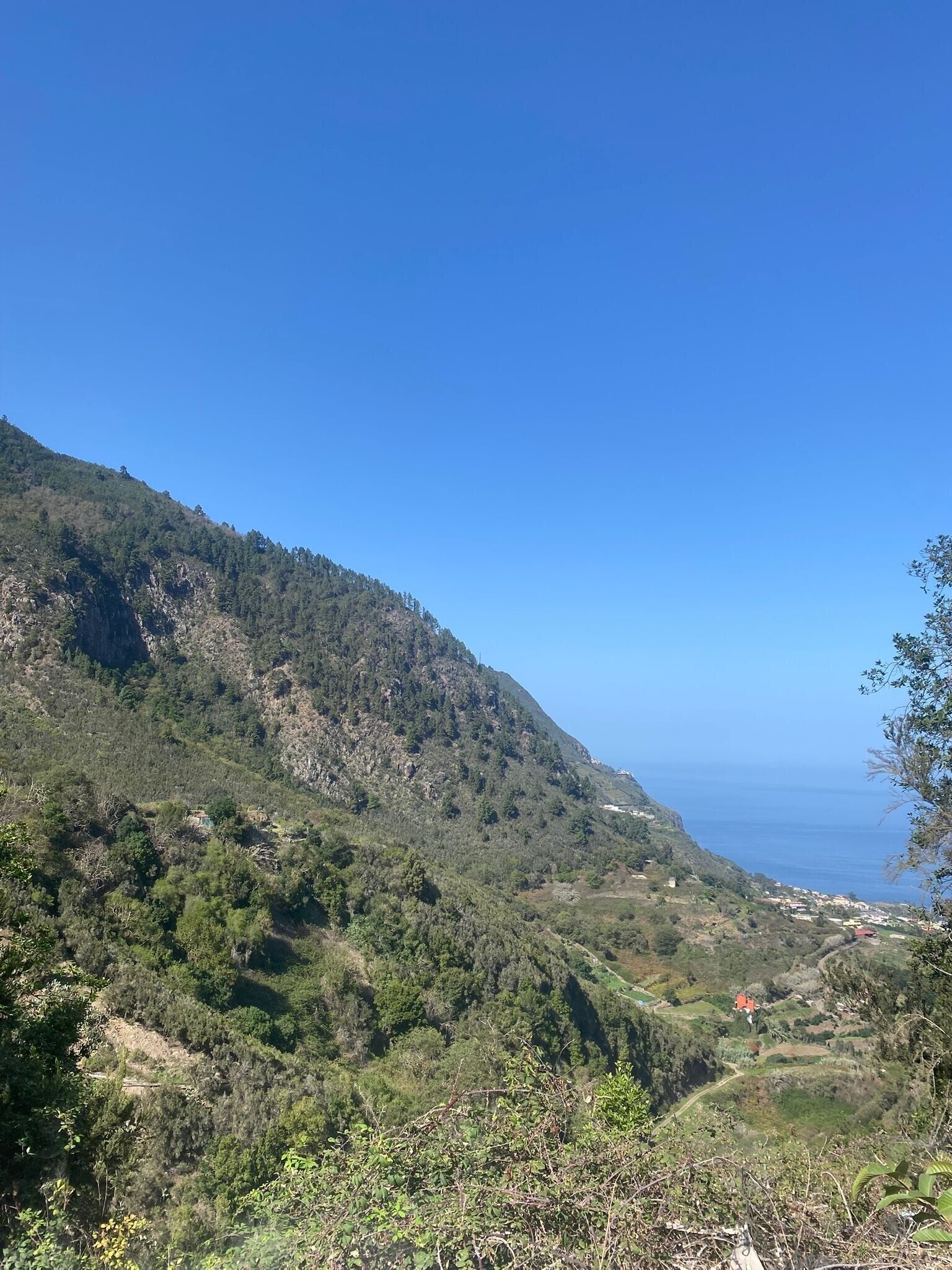 A mountainous landscape with a clear sky.