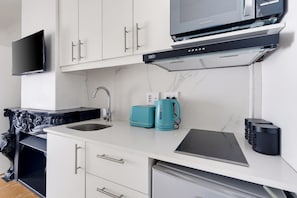 Microwave, stovetop, electric kettle, toaster