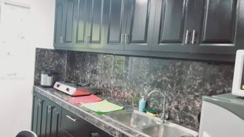 Apartamento, 2 quartos, para fumantes, vista para o jardim | Cozinha privada