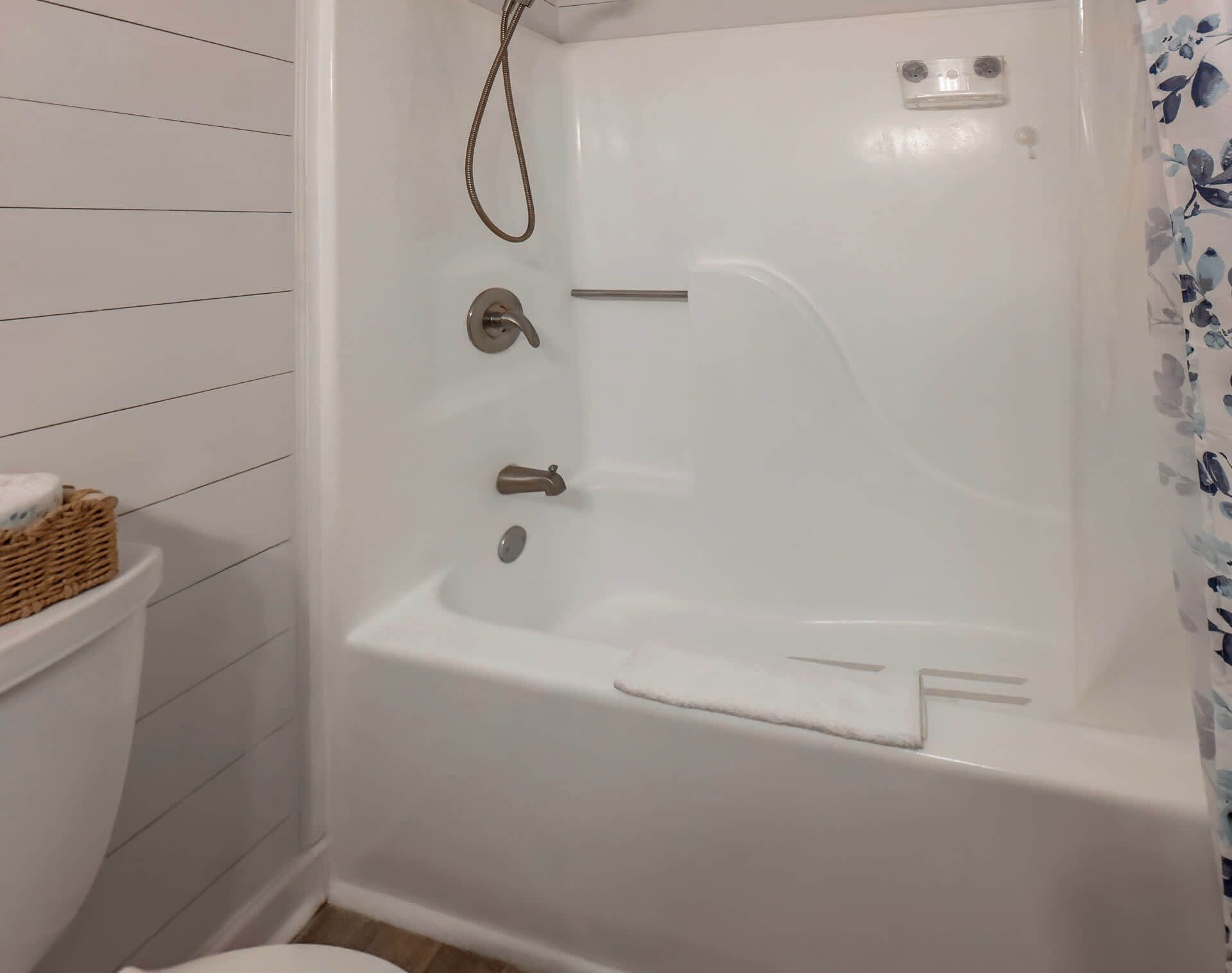 Shower, hair dryer, towels, shampoo