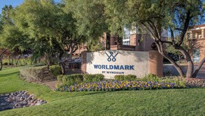 A sign for 'Worldmark by Wyndham' with a landscaped area in front. - Worldmark Boulevard 2-bedroom resort in beautiful Las Vegas (Las Vegas)