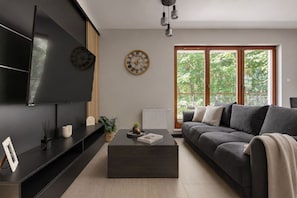 Appartement Deluxe, balcon | Coin séjour