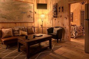 Living area - Cabin Retreat with Fire Pit & Scenic Ridge Views in Caddo Gap, Arkansas (Caddo Gap)