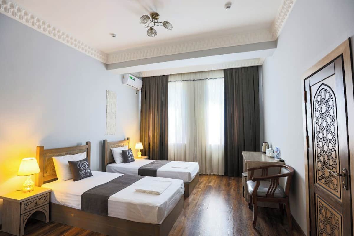 Habitación básica con 1 cama doble o 2 individuales | Escritorio, espacio para trabajar con un portátil, wifi gratis