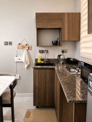 Apartamento luxo, sacada | Cozinha privada