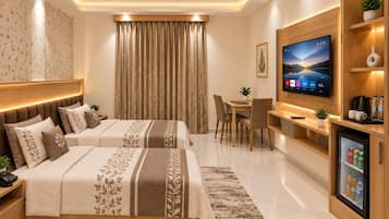 A modern hotel room with a bed, a desk, a television, and a mini-fridge.