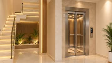 A modern elevator with a metallic finish, a staircase with illuminated steps, and a potted plant to the right.