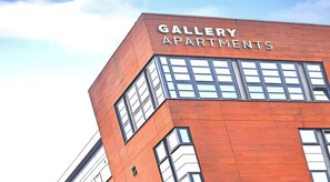 A building with the sign 'GALLERY APARTMENTS' indicating a residential complex. - Student Only Gallery Apartments (Glasgow)