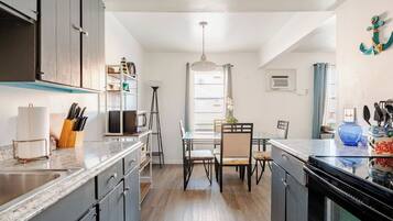 Coffee/tea maker, fridge, microwave, oven