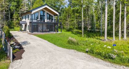 Brand-New Construction Lakefront Home with Sand Beach in serene Sturgeon Bay!