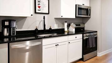 Coffee/tea maker, fridge, microwave, oven