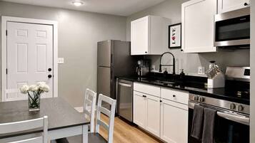 Coffee/tea maker, fridge, microwave, oven