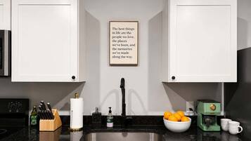 Coffee/tea maker, fridge, microwave, oven