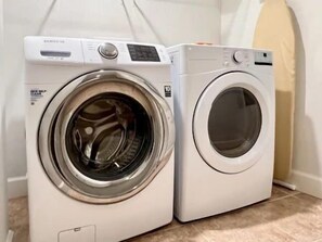 Two front-loading washing machines. - Poolside 2BR Condo w/ Hammock Beach Resort Access (Palm Coast)