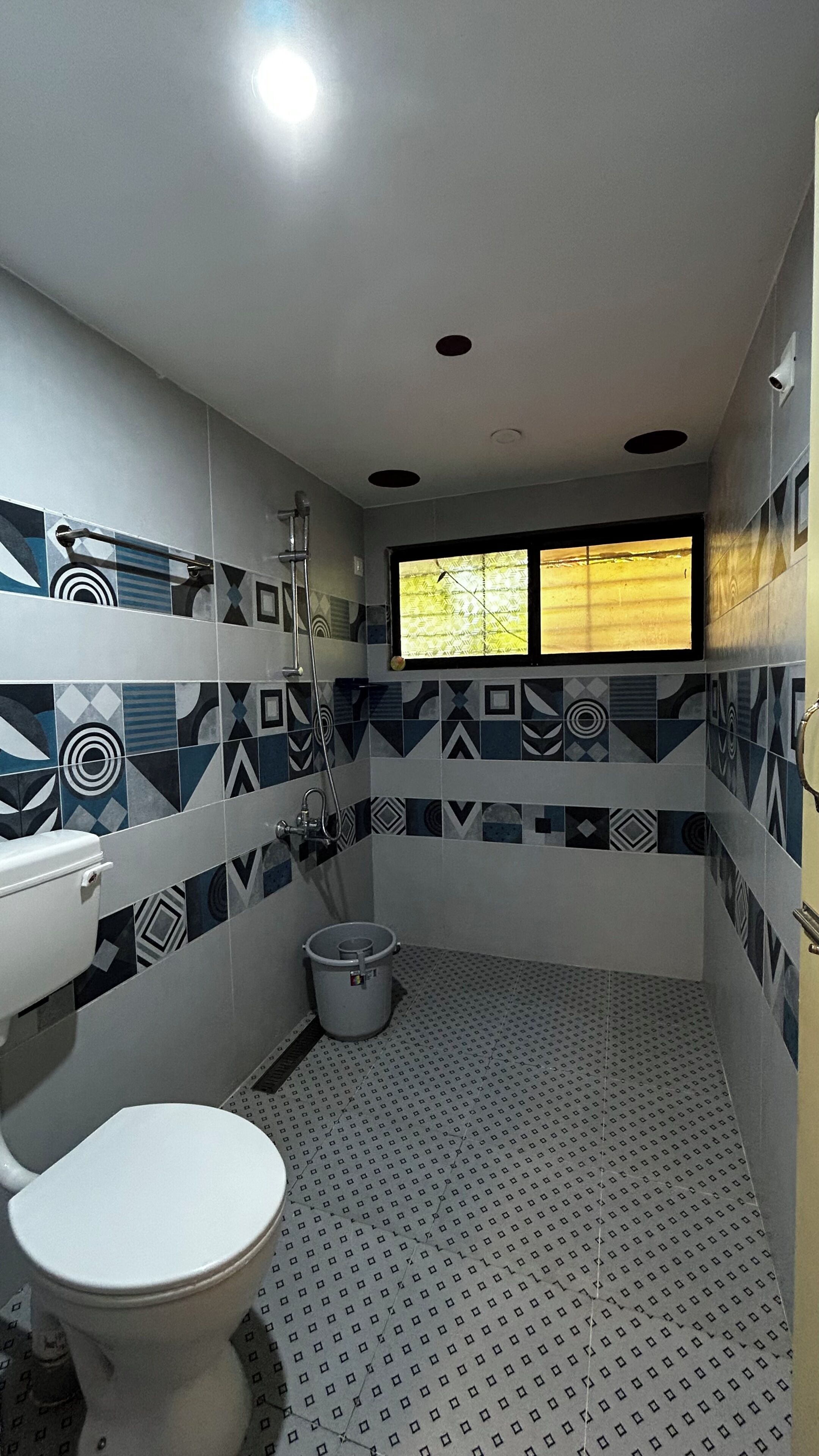 Shower, towels, soap, toilet paper