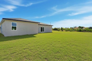 A single-story building with a flat roof and a small front porch.