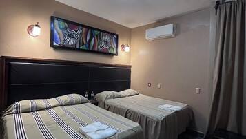 Habitación doble familiar | Tabla de planchar con plancha y wifi gratis