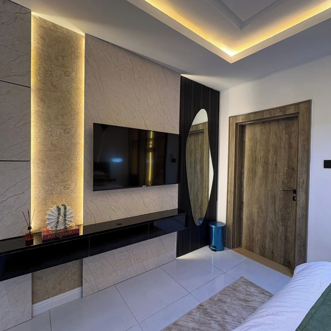 Economy Apartment, Balcony, City View | In-room safe, desk, laptop workspace, blackout drapes