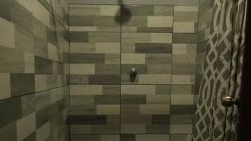 Shower, towels, soap, toilet paper