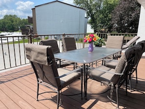 Outdoor dining - 1 bedroom condo w/larger deck, indoor and outdoor pool, Sunny view of harbor. (Clear Lake)