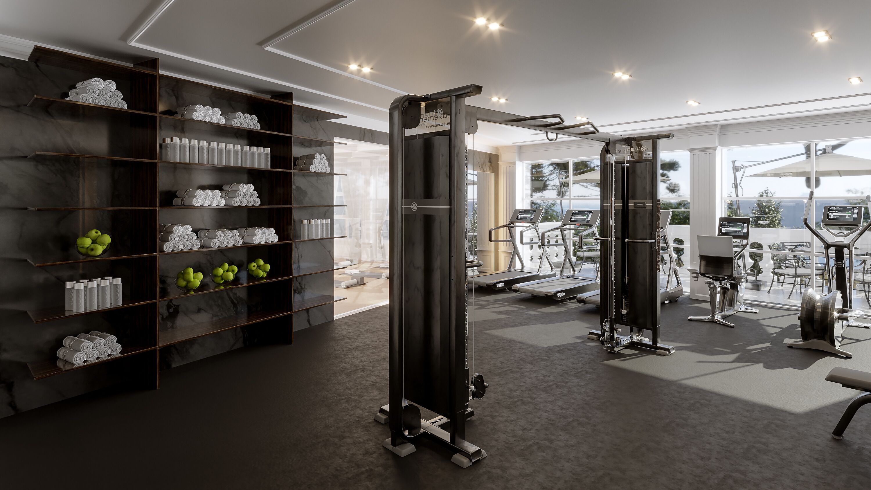 Un gimnasio con equipamiento de ejercicio, una pared de mármol y estantes con toallas y botellas.