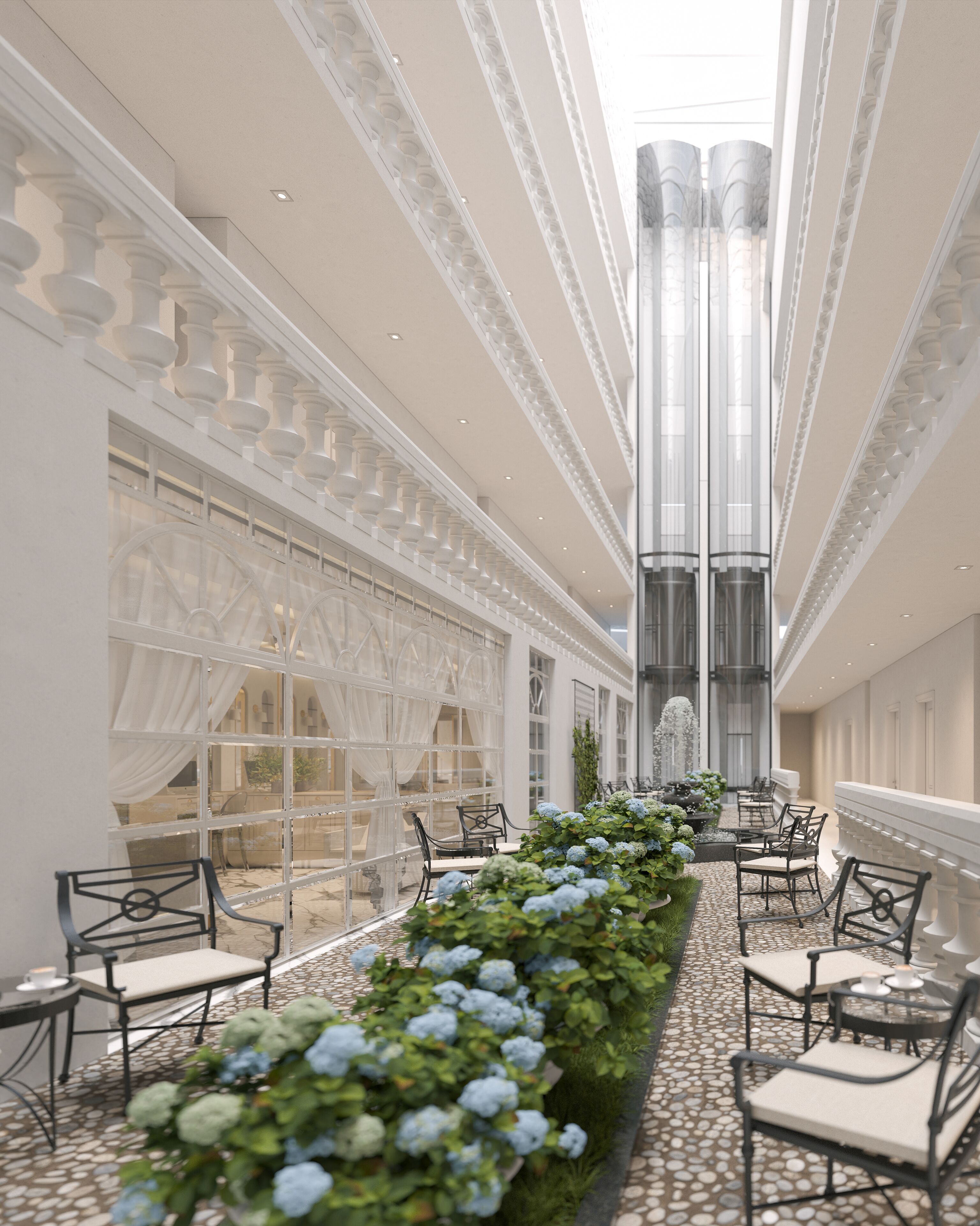 A corridor with seating arrangements and a central column.