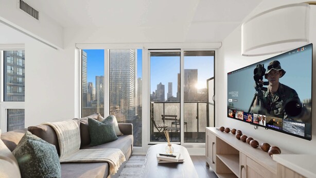 Living area - Stylish 2BR Retreat, Patio & Skyline Views (Toronto)