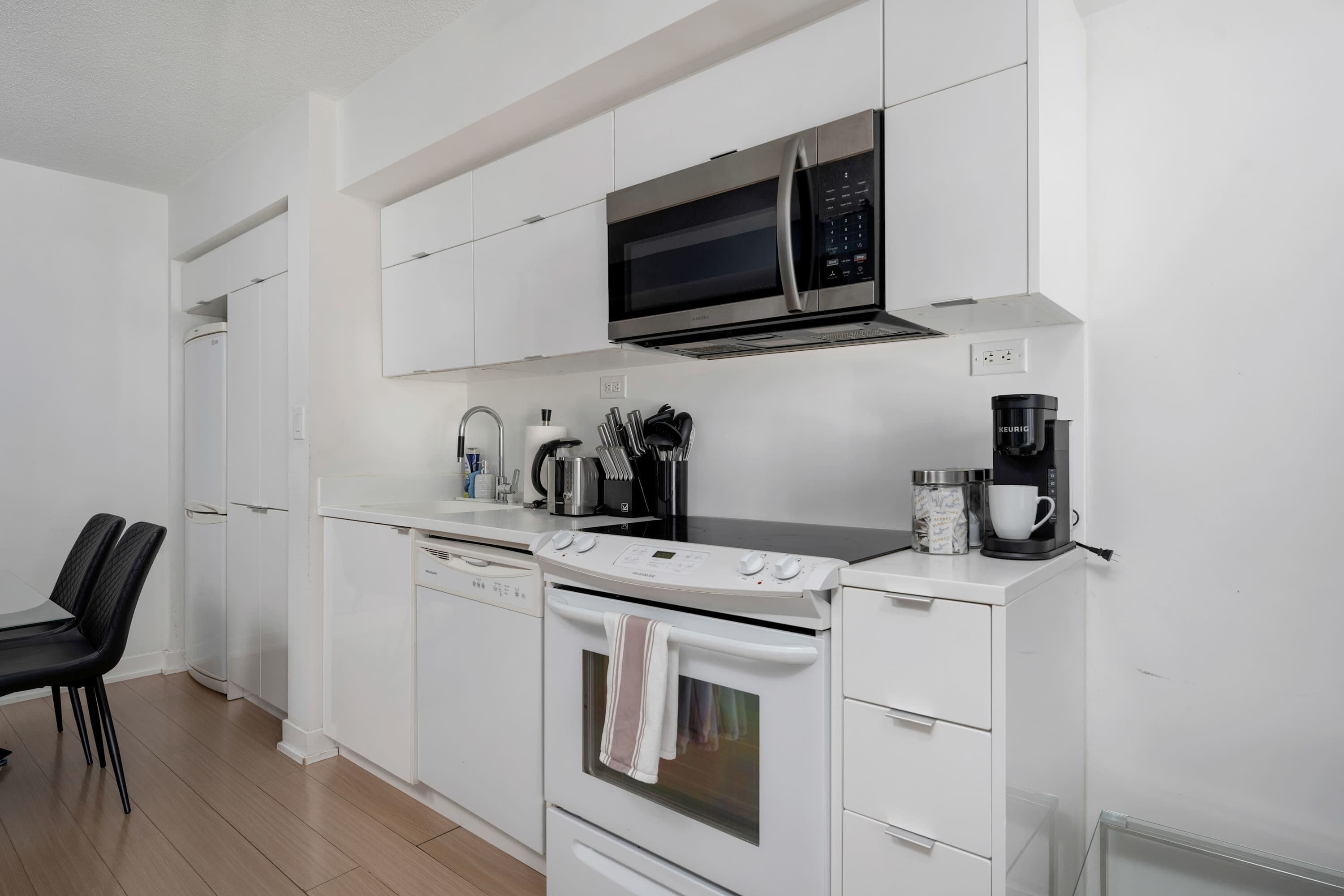 Coffee/tea maker, fridge, microwave, oven