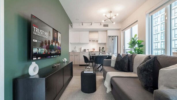 Living area - Chic Downtown 3BR Retreat Private Patio (Toronto)