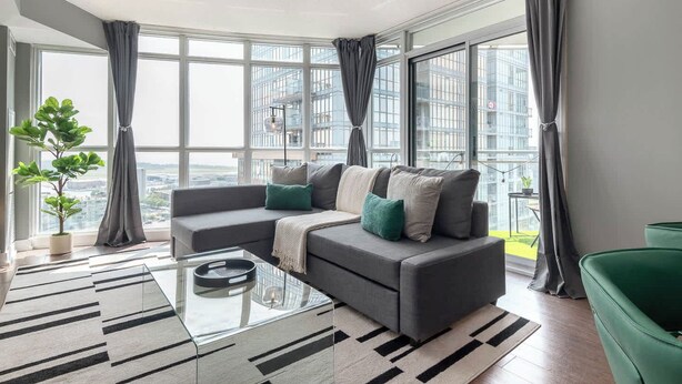 Living area - City Lights & Balcony Views | 2BR Downtown Gem! (Toronto)