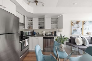 Coffee/tea maker, fridge, microwave, oven