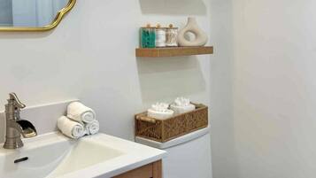 Hair dryer, towels, soap, toilet paper