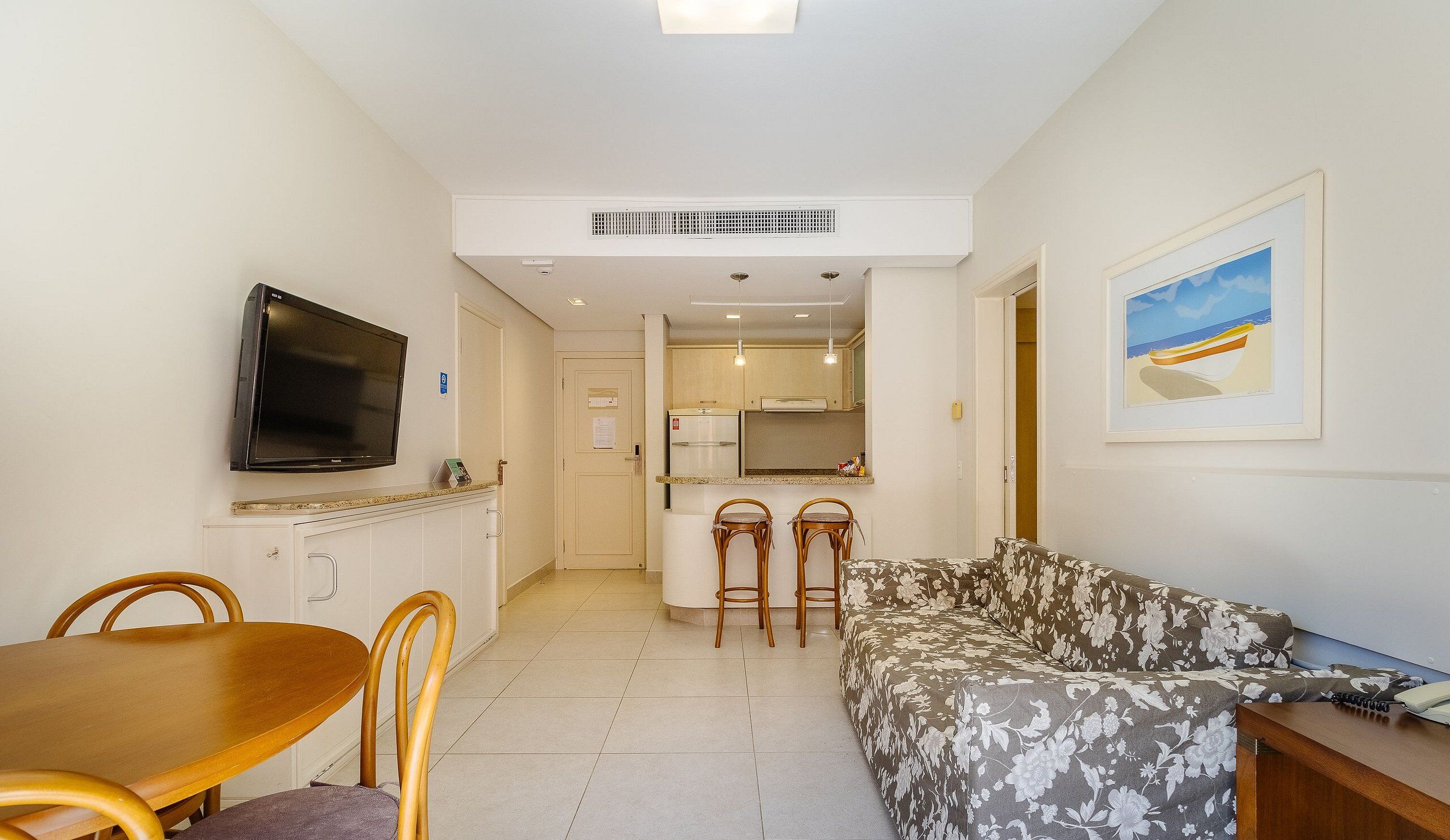 Basic Apartment | Living area | 40-inch TV with digital channels