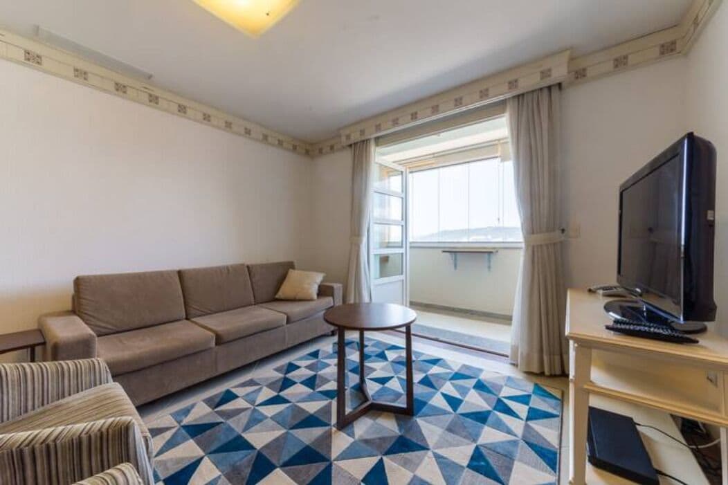 Basic Apartment | Living area | 40-inch TV with digital channels