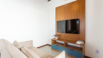 Villa | Living area | 40-inch TV with digital channels