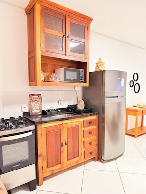Private kitchen - Fully equipped and cozy apartment, 15 minutes from Morumbi Stadium. (São Paulo)