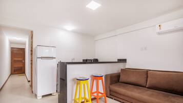 Basic Apartment | Living area | 40-inch TV with digital channels