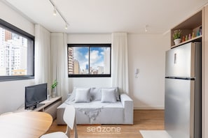 Basic Apartment | Living area | 40-inch TV with digital channels - Functional Apt w/ Garage in Curitiba Wsh0801 (Curitiba)