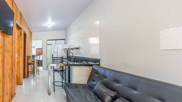 Villa | Living area | 40-inch TV with digital channels
