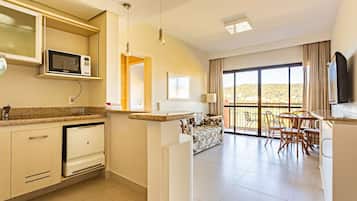 Basic Apartment | Living area | 40-inch TV with digital channels