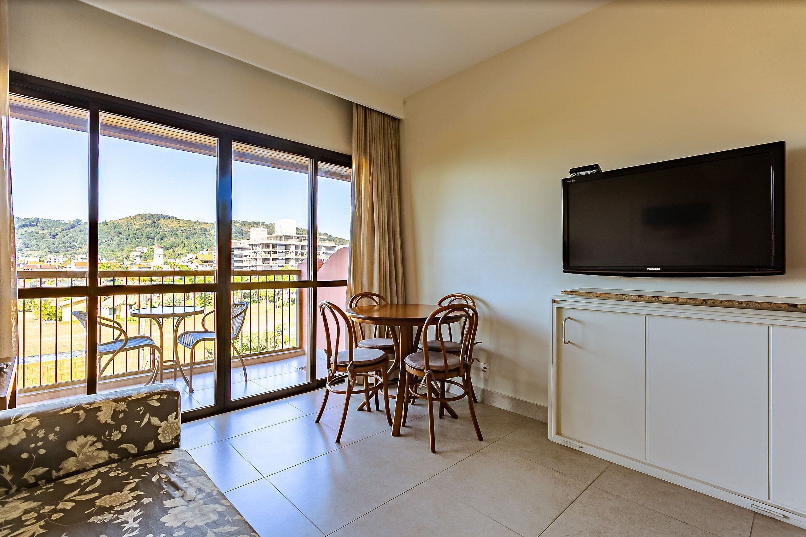 Basic Apartment | Living area | 40-inch TV with digital channels