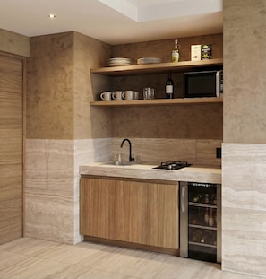 A modern kitchen with wooden cabinets, a built-in dishwasher, and a microwave on a shelf.