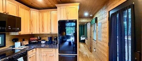 Coffee/tea maker, fridge, oven, stovetop