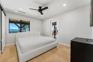Downstairs King Bedroom leads to Wellness Sanctuary - Nordic Spa Chalet: Hot Tub, Sauna, Views (Truckee)