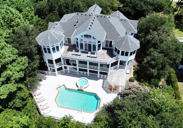 A large house with multiple decks and a swimming pool. - Soundside-ELEV, Priv pool, HTub, Rec Rm-CC328, Pipers Perch (Corolla)