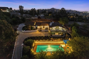 A large house with a swimming pool, a covered patio, and a curved driveway. - Pool, Big Yard, View, King Bed, Parking, 4BR - 2.5Bth (El Cajon)