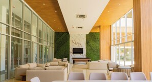A modern interior with a pool table, sofas, and a television. - New KeyPoint® Delventto 2-Bedroom | Terrace (Santa Marta)