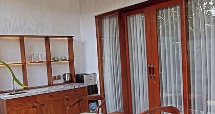 Cozy 1-bedroom hotel suite in enchanting Ubud
with AC