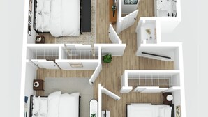 A modern apartment layout with two bedrooms, a bathroom, and a living area.