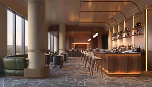 A modern bar area with a stone floor, seating, and a bar counter with shelves of bottles. - Crystalbrook Sam (Adelaide)